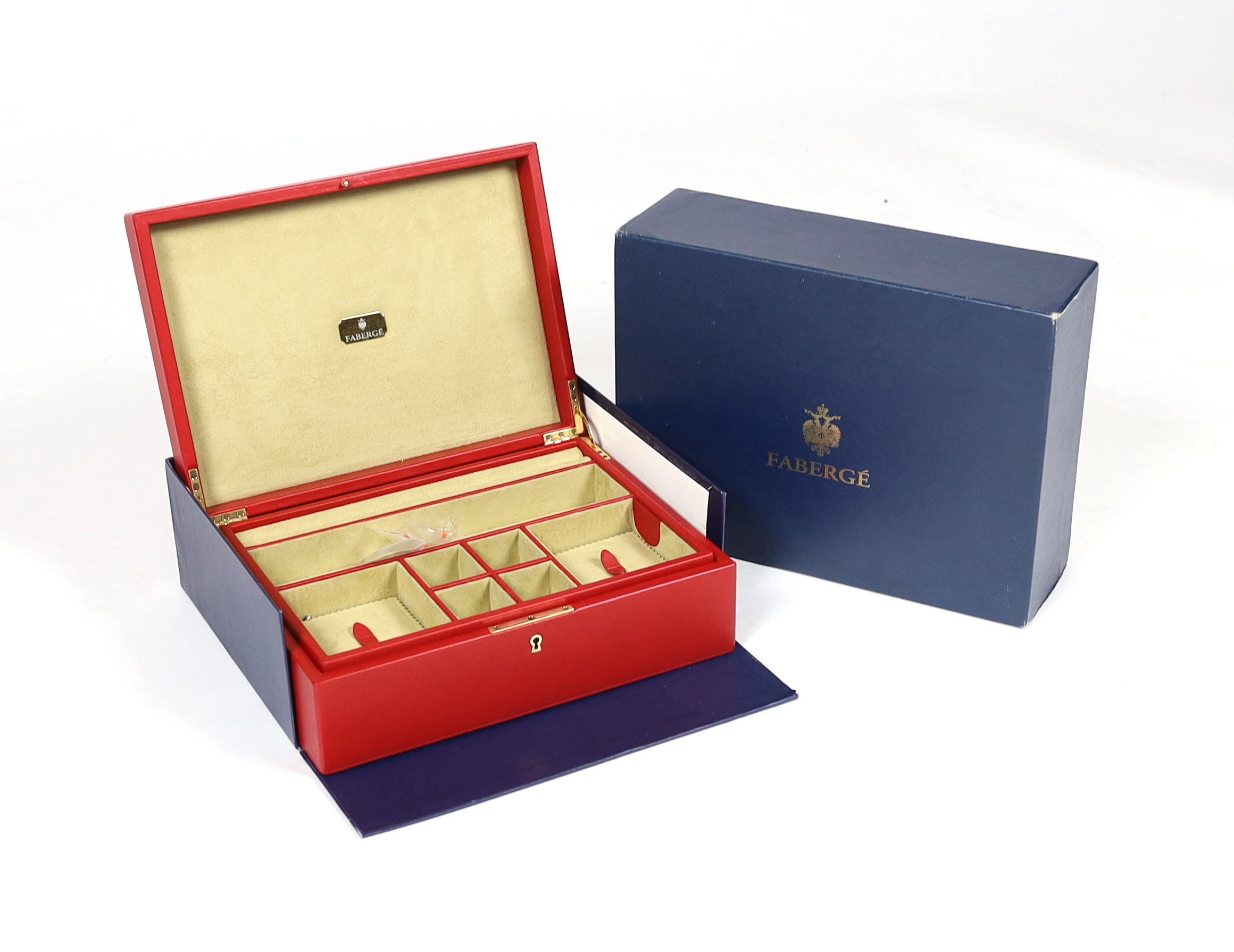 A Fabergé cased red leather jewellery box, width 33cm